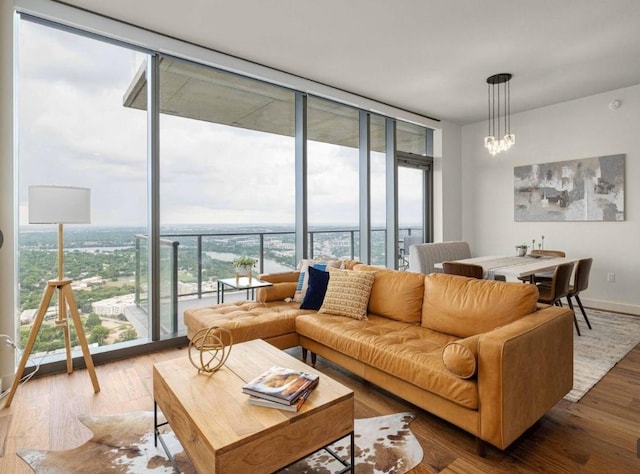 44 E Ave Unit 4305, Austin, TX 78701 - living area with expansive windows, wood finished floors, and plenty of natural light