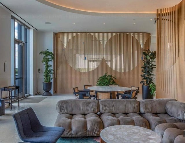 44 E Ave Unit 4305, Austin, TX 78701 - living area with a wall of windows