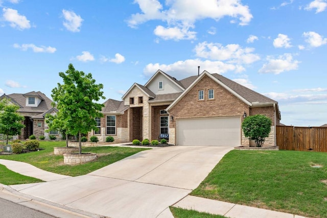 629 Asher Ct, Leander, TX 78641 - traditional-style home featuring concrete driveway, brick siding, an attached garage, and roof with shingles