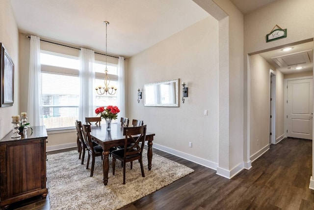629 Asher Ct, Leander, TX 78641 - dining room with dark wood-type flooring and a chandelier