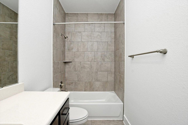 full bathroom featuring tile patterned flooring, shower / bathtub combination, a textured wall, toilet, and vanity