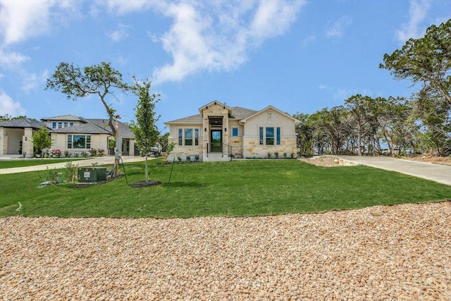 view of front of house with a front lawn and stucco siding