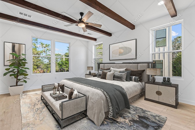 208 Ulupau Cir, Bastrop, TX 78602 - bedroom featuring beam ceiling and a ceiling fan