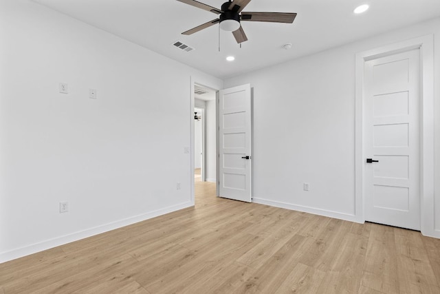 208 Ulupau Cir, Bastrop, TX 78602 - unfurnished bedroom featuring light wood finished floors, recessed lighting, baseboards, and a ceiling fan