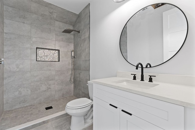 208 Ulupau Cir, Bastrop, TX 78602 - bathroom featuring vanity, toilet, and tiled shower