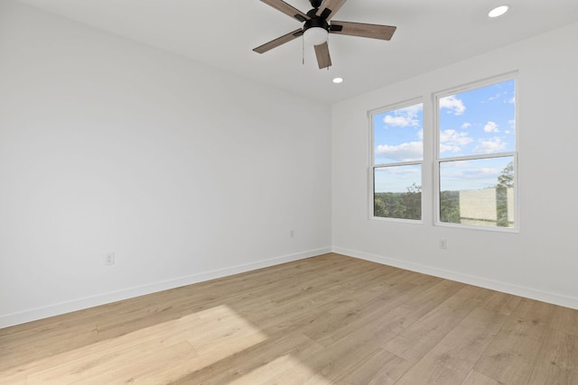 208 Ulupau Cir, Bastrop, TX 78602 - unfurnished room with baseboards, recessed lighting, light wood-style floors, and a ceiling fan