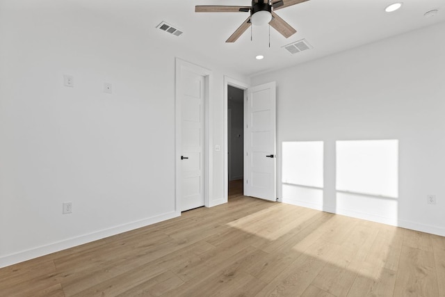 208 Ulupau Cir, Bastrop, TX 78602 - empty room featuring ceiling fan, recessed lighting, and light wood finished floors