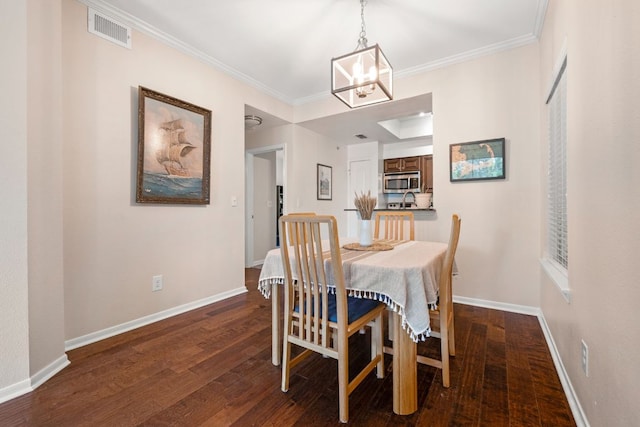 6000 Shepherd Mountain Cv Unit 302, Austin, TX 78730 - dining room with a chandelier, dark wood finished floors, crown molding, and baseboards