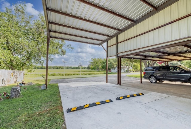 110 Live Oak St, Gonzales, TX 78629 - view of car parking featuring fence
