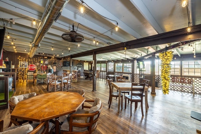 110 Live Oak St, Gonzales, TX 78629 - dining area with beam ceiling, wood finished floors, and a wealth of natural light