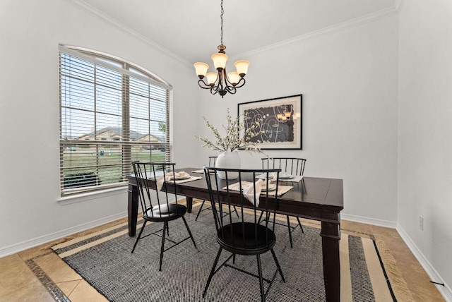 dining room with baseboards, an inviting chandelier, and ornamental molding