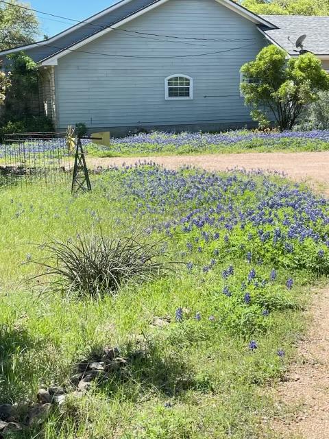 view of property exterior with fence