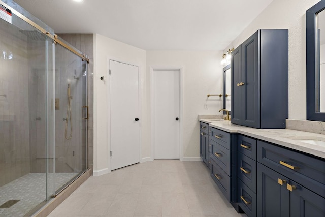 1337 Neans Dr, Austin, TX 78758 - bathroom featuring double vanity, tile patterned floors, a stall shower, and a sink