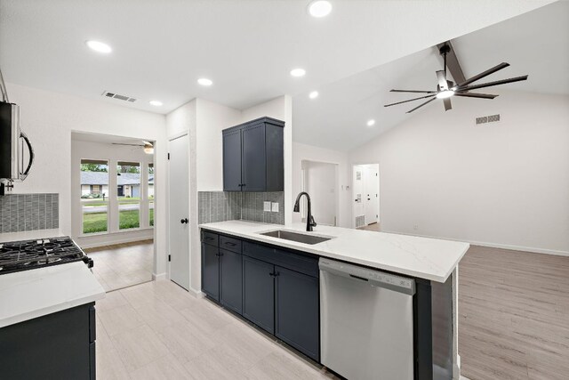 1337 Neans Dr, Austin, TX 78758 - kitchen featuring visible vents, a sink, a peninsula, appliances with stainless steel finishes, and ceiling fan