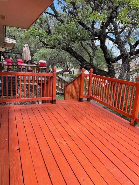 wooden deck with visible vents