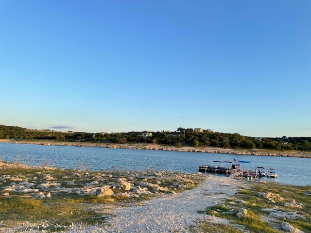 view of dock with a water view