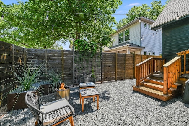 6307 Camino Real Unit 1, Austin, TX 78757 - view of patio / terrace featuring a fenced backyard and a deck