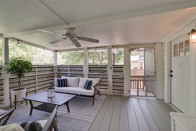 6307 Camino Real Unit 1, Austin, TX 78757 - sunroom / solarium with ceiling fan and outdoor lounge area