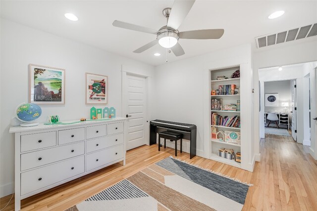 6307 Camino Real Unit 1, Austin, TX 78757 - interior space featuring light wood-style flooring, visible vents, recessed lighting, and a ceiling fan