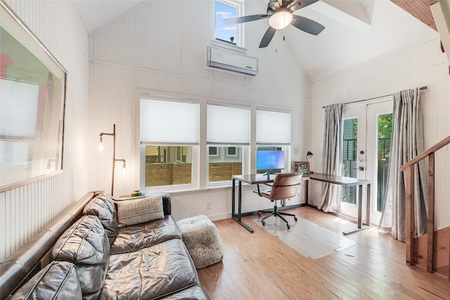 6307 Camino Real Unit 1, Austin, TX 78757 - home office featuring ceiling fan, a wealth of natural light, light wood-style floors, and a wall mounted AC