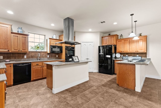 2800 Lomas Rodando Calzada Rd, Kempner, TX 76539 - kitchen with black appliances, island range hood, decorative backsplash, light stone counters, and hanging light fixtures