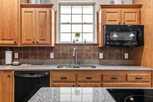 2800 Lomas Rodando Calzada Rd, Kempner, TX 76539 - kitchen featuring black appliances, a sink, plenty of natural light, and decorative backsplash