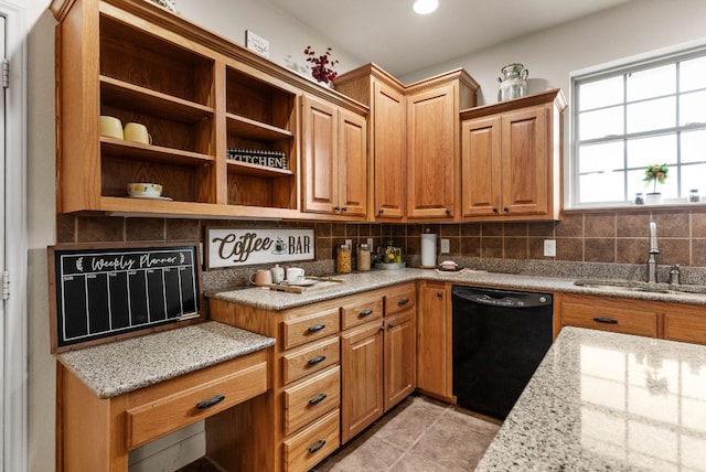 2800 Lomas Rodando Calzada Rd, Kempner, TX 76539 - kitchen with dishwasher, a sink, tasteful backsplash, and light stone counters