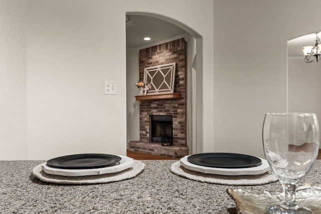 2800 Lomas Rodando Calzada Rd, Kempner, TX 76539 - bathroom with a chandelier and a brick fireplace