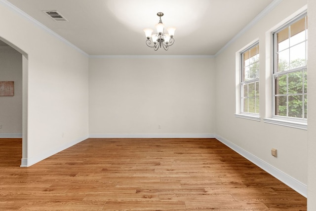 2800 Lomas Rodando Calzada Rd, Kempner, TX 76539 - spare room featuring a chandelier, crown molding, light wood-style floors, and baseboards