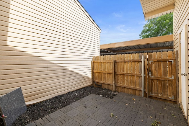 view of patio / terrace with a gate and fence