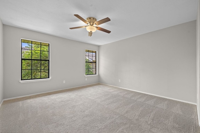 8400 Jamestown Dr Unit 410, Austin, TX 78758 - spare room featuring ceiling fan and carpet flooring