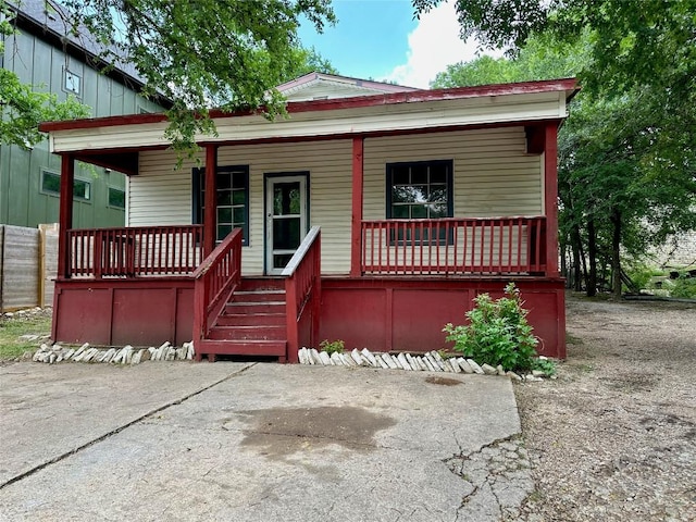 1221 Delano St, Austin, TX 78721 - view of front of home with a porch