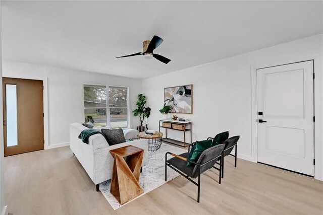 5000 Pack Saddle Pass, Austin, TX 78745 - living area with light wood-style floors and ceiling fan