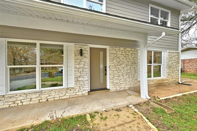 5000 Pack Saddle Pass, Austin, TX 78745 - entrance to property with stone siding