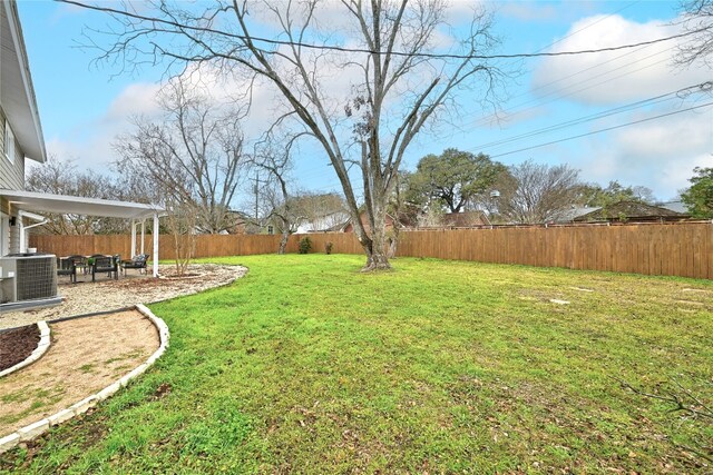 5000 Pack Saddle Pass, Austin, TX 78745 - view of yard with central air condition unit and a patio area