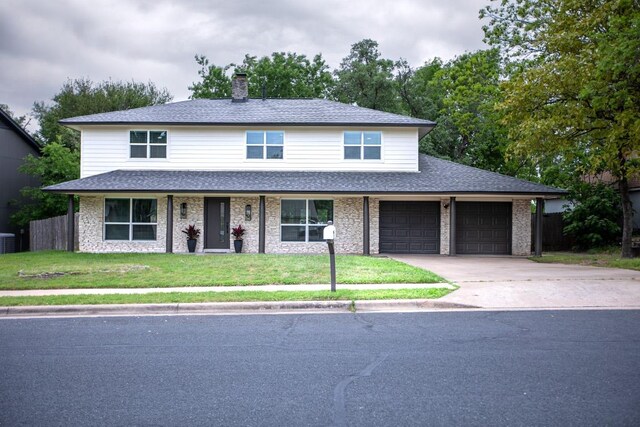 2011 Malvern Hill Dr, Austin, TX 78745 - traditional home featuring driveway, a chimney, an attached garage, roof with shingles, and cooling unit