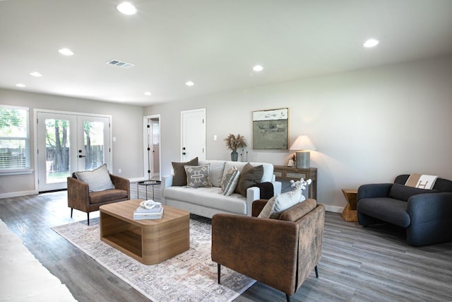 2011 Malvern Hill Dr, Austin, TX 78745 - living room featuring baseboards, wood finished floors, recessed lighting, and french doors