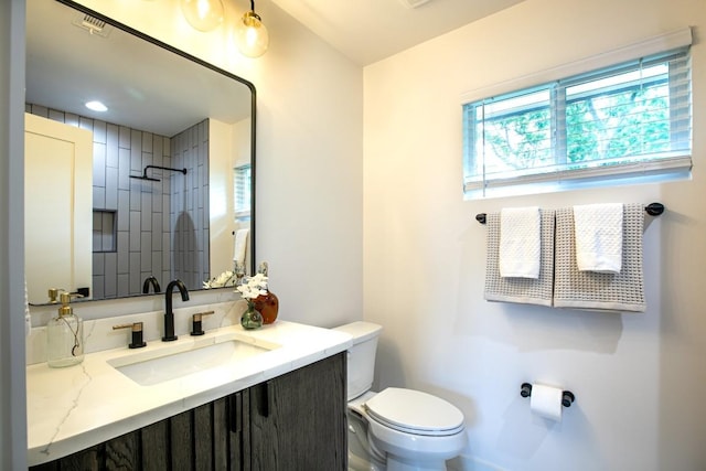 2011 Malvern Hill Dr, Austin, TX 78745 - full bath featuring toilet, vanity, and a shower