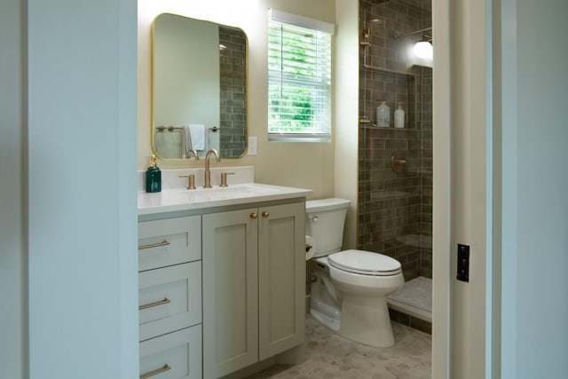 2011 Malvern Hill Dr, Austin, TX 78745 - bathroom with vanity, toilet, and a tile shower