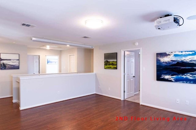 102 Buck Shot Ct, Bastrop, TX 78602 - spare room with wood finished floors and baseboards