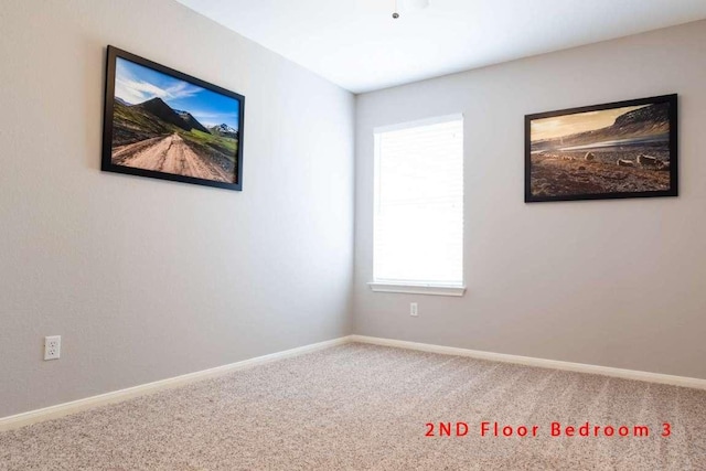 102 Buck Shot Ct, Bastrop, TX 78602 - carpeted empty room with baseboards