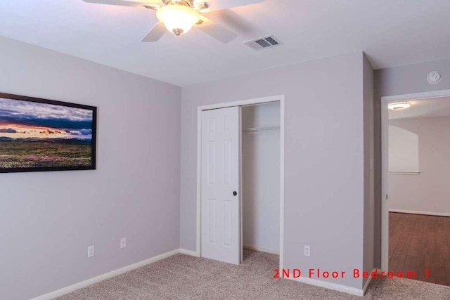 102 Buck Shot Ct, Bastrop, TX 78602 - unfurnished bedroom featuring baseboards, a closet, carpet floors, and a ceiling fan
