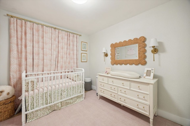 2602 Baxter Dr, Austin, TX 78745 - bedroom with light carpet and a crib
