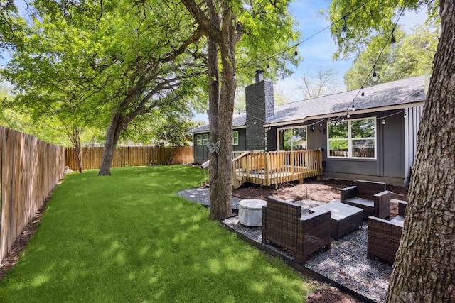 2602 Baxter Dr, Austin, TX 78745 - view of yard featuring an outdoor hangout area and a deck