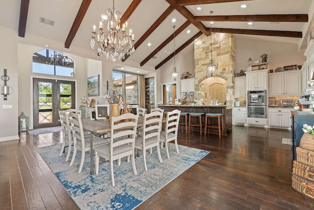 dining space with high vaulted ceiling, a notable chandelier, beam ceiling, and visible vents