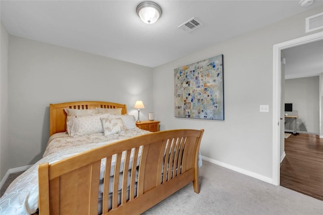 313 Brenham Pass, Georgetown, TX 78633 - bedroom featuring baseboards, visible vents, and carpet