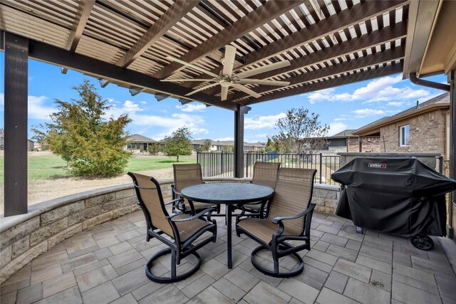 313 Brenham Pass, Georgetown, TX 78633 - view of patio featuring outdoor dining area, a pergola, fence, and grilling area