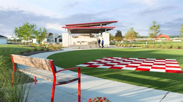 surrounding community featuring a lawn