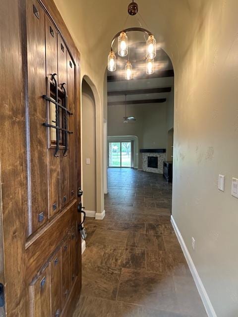 201 Grand Oaks Ln, Georgetown, TX 78628 - corridor featuring arched walkways and baseboards