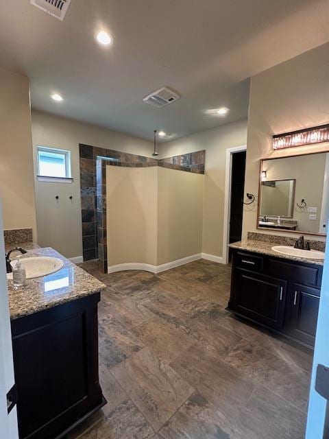 201 Grand Oaks Ln, Georgetown, TX 78628 - full bath featuring two vanities and walk in shower